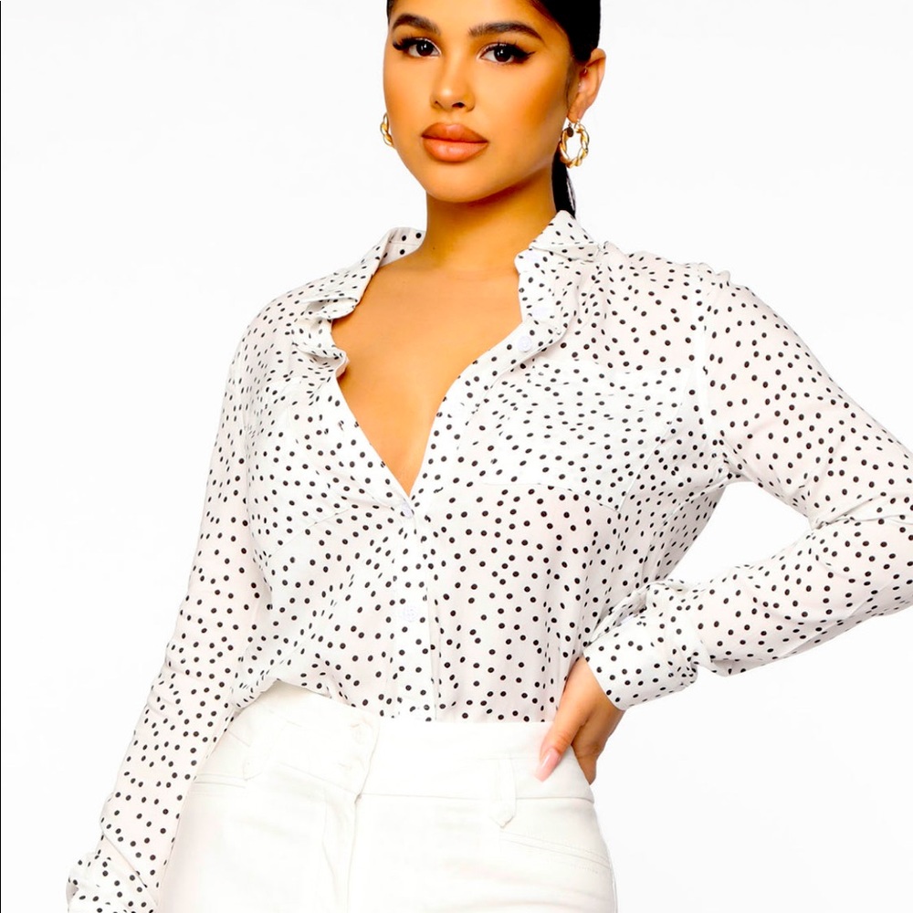 White with black polka dots.